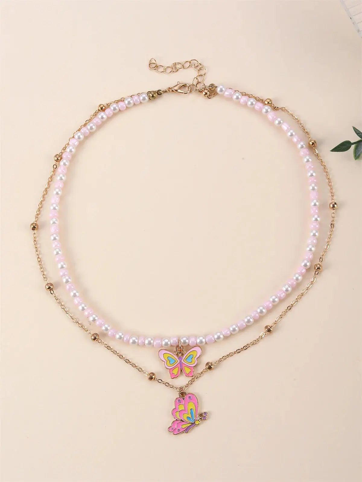 Bijou bohème enfant fille – pendentif papillon pink