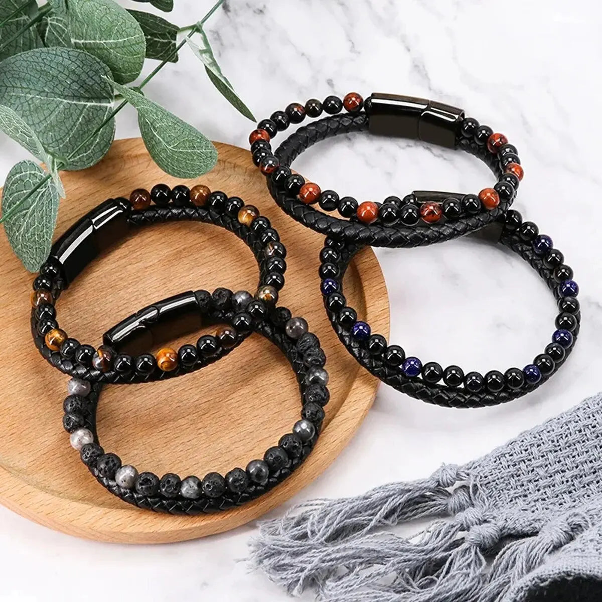 Pulsera de piedra natural: ojo de tigre, ónix y lava. Estilo unisex y equilibrado.