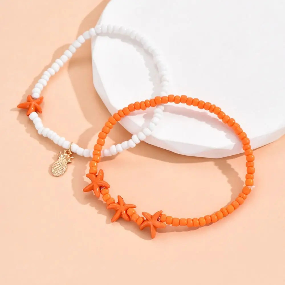 Tobillera de estrella de mar JOWomen para mujer, joyería de playa, pulsera bohemia de concha de caracol para la pierna, tobillera con cuentas y flores