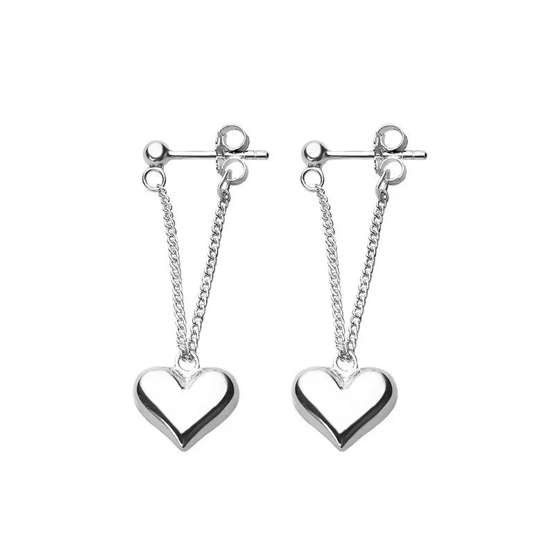 Boucles d’oreilles argentées avec pendentif cœur – bijou raffiné femme